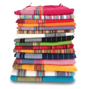 Kikois/Kikoys - 100% cotton woven Kenyan beach wrap stack showing mixed colour variations, handmade by Africa Smiles.